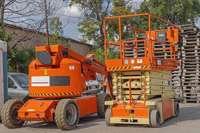 industrial forklift lifting heavy loads in warehouse in Berthoud